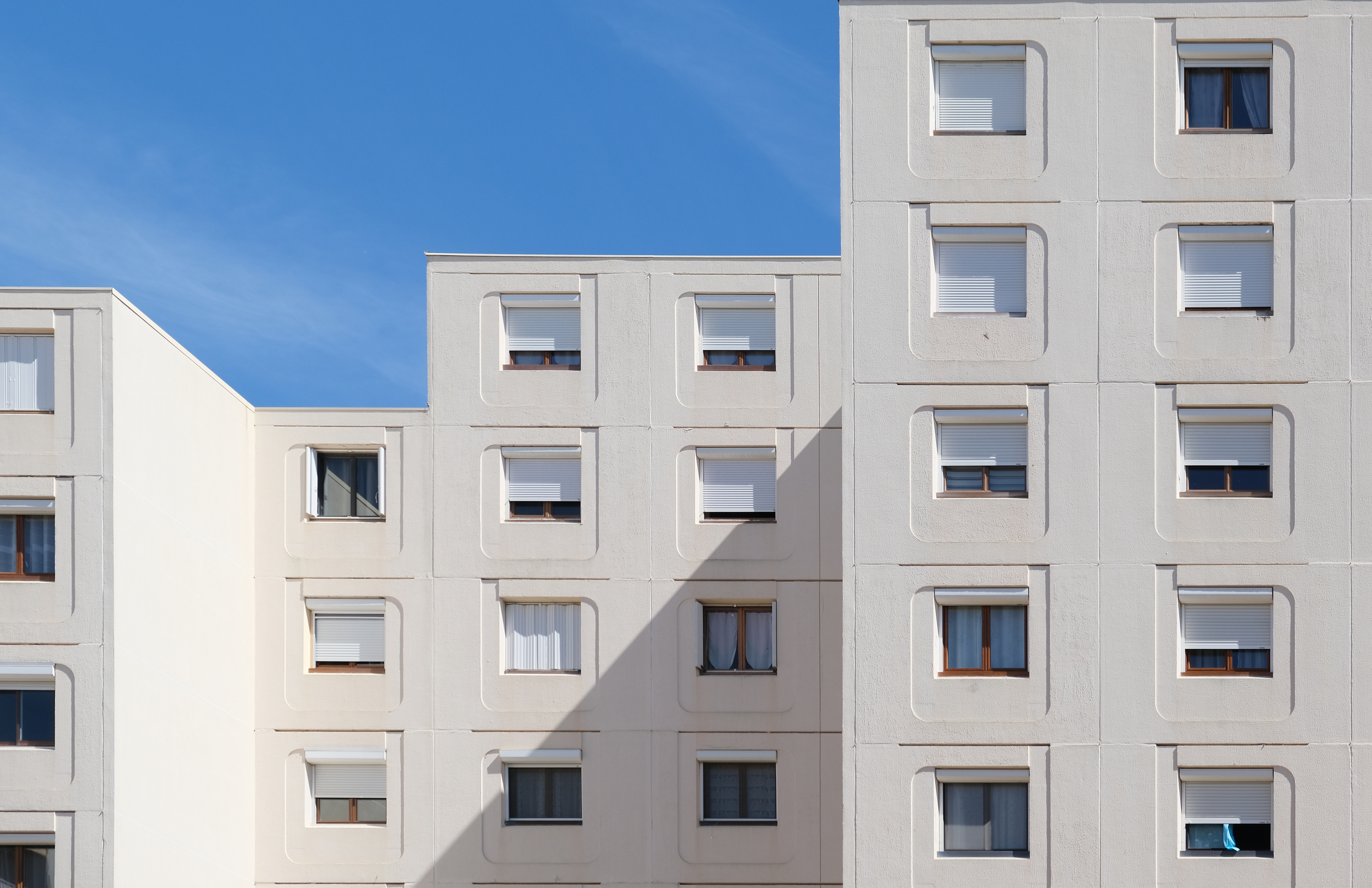 Apartment building with balconies and windows